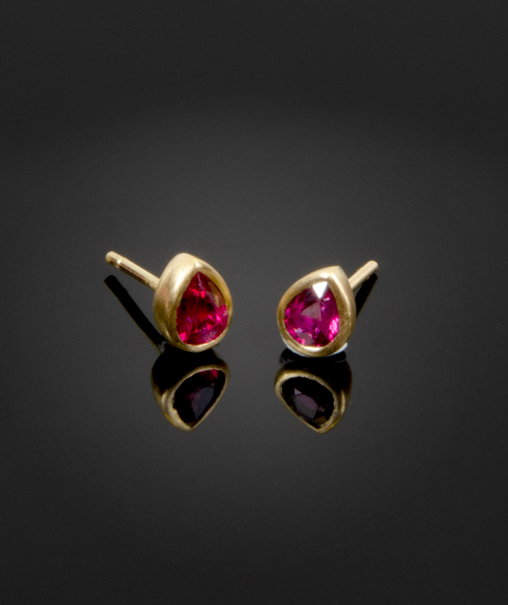 18K brushed yellow gold stud earrings with pear shaped 1.29 tcw Rubies
