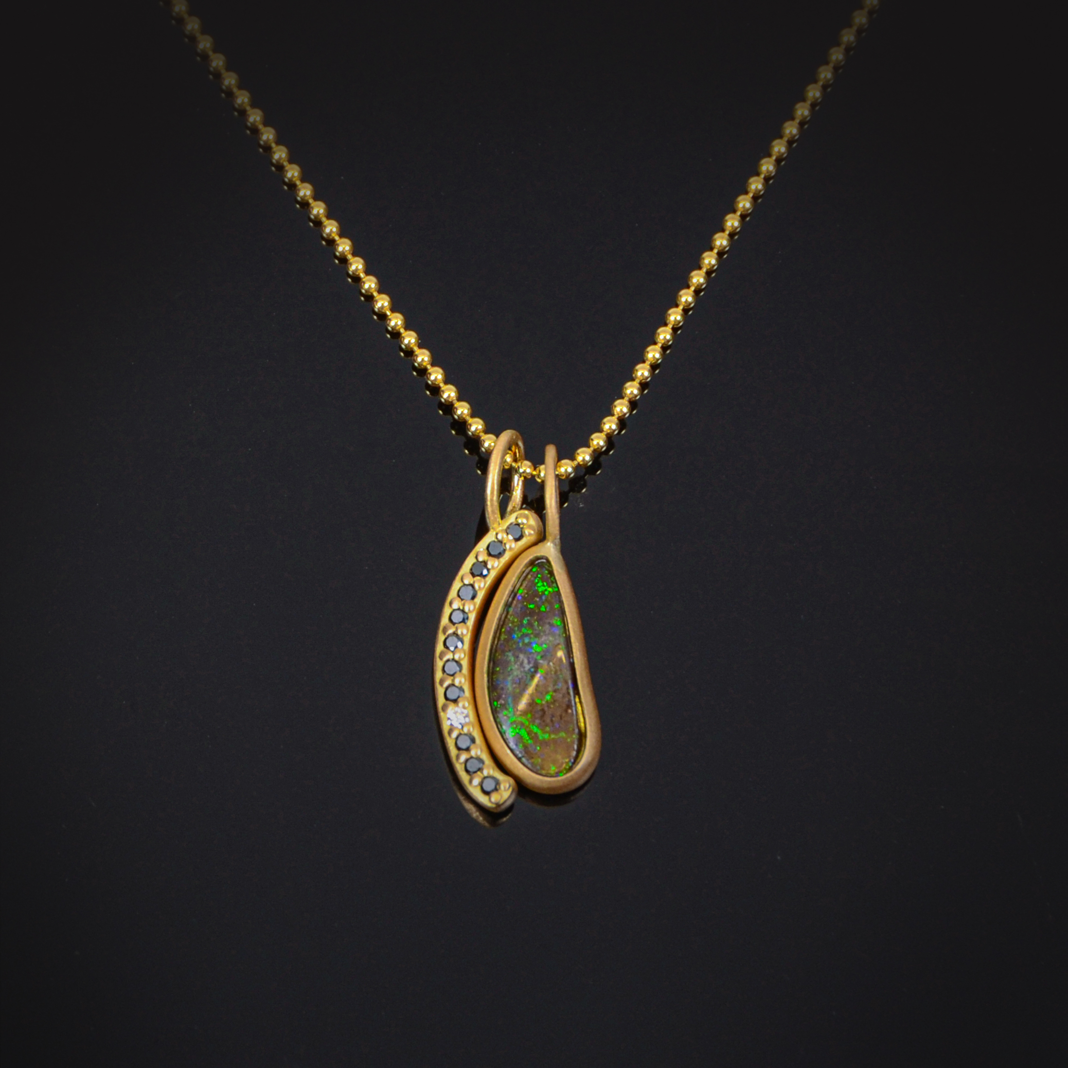 18K brushed yellow gold necklace with black and colorless Diamonds, Boulder Opal and Apatite and gold beads