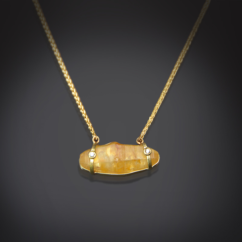 18K brushed yellow gold necklace with yellow Sapphire crystal and bezel set Diamonds