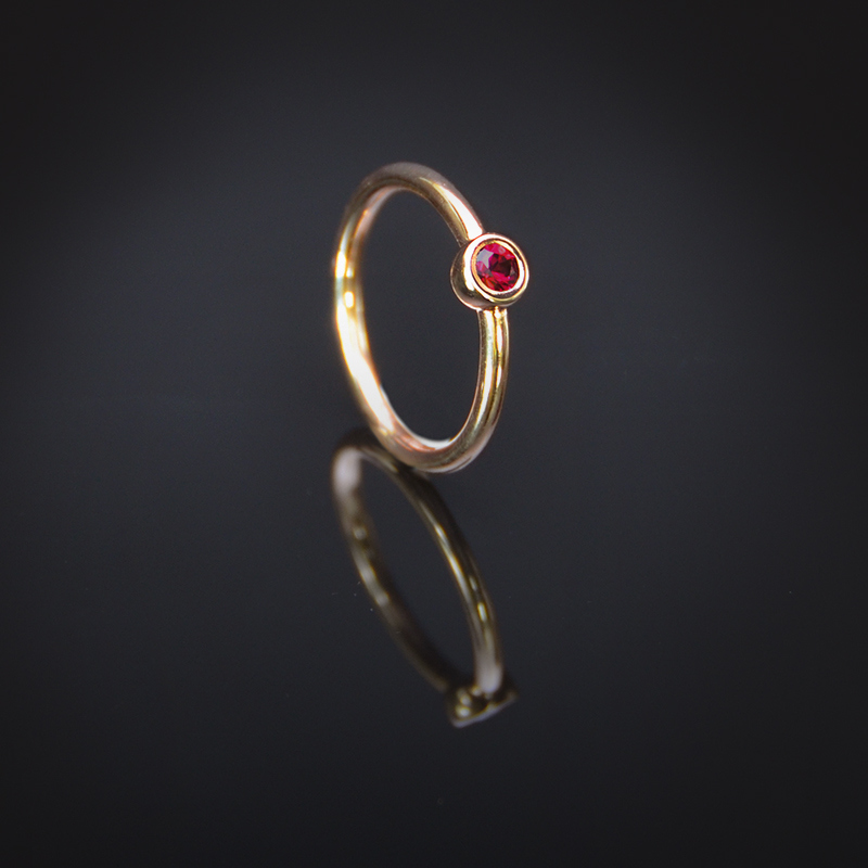 18K rose gold ring with bezel set Ruby