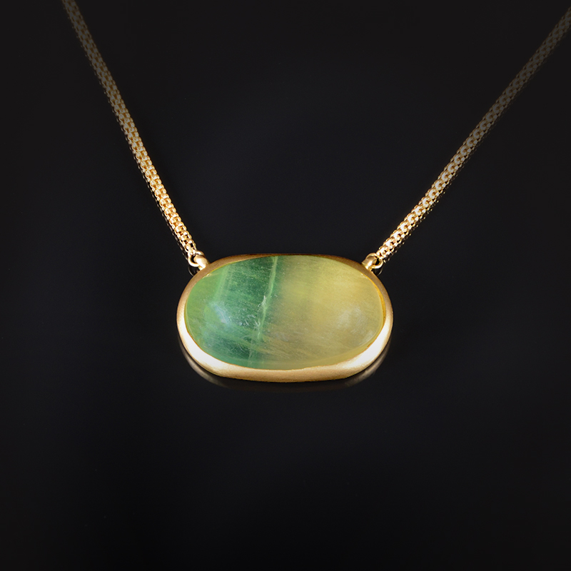 18K brushed yellow gold necklace with a bezel set Fluorite