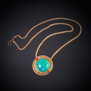 18K rose gold necklace with 46.5 ct Gem Silica surrounded by multicolored Sapphire briolette beads